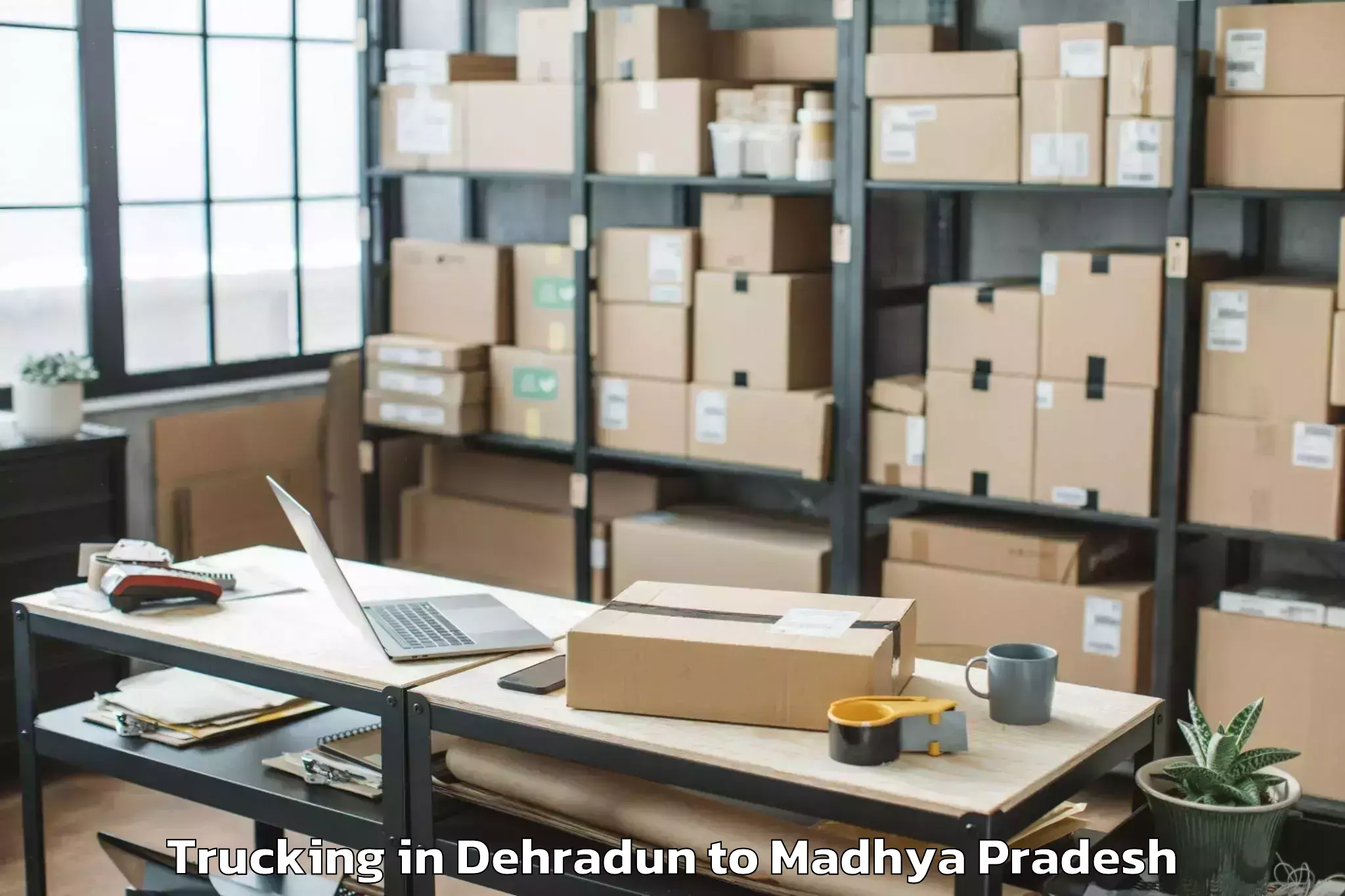 Easy Dehradun to Sardarpur Trucking Booking